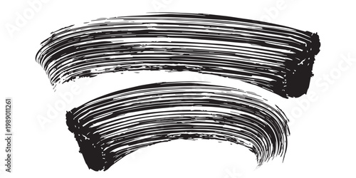 Black mascara brush strokes isolated on white background.