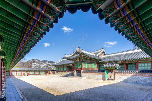 Принти на полотні Beautiful architectural perspective of Gyeongbokgung Palace framed by colorful traditional Korean Dancheong roof eaves