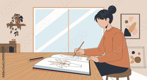 Woman drawing on large paper.