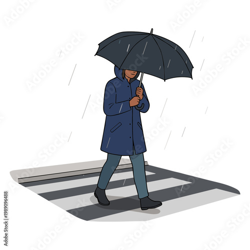 A person walks across a crosswalk on a rainy day holding an umbrella.