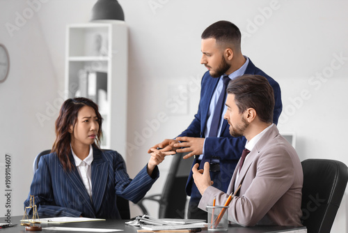 Male court mediator working...