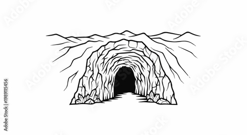 Dark cave entrance with rocky tunnel and mountainous exterior