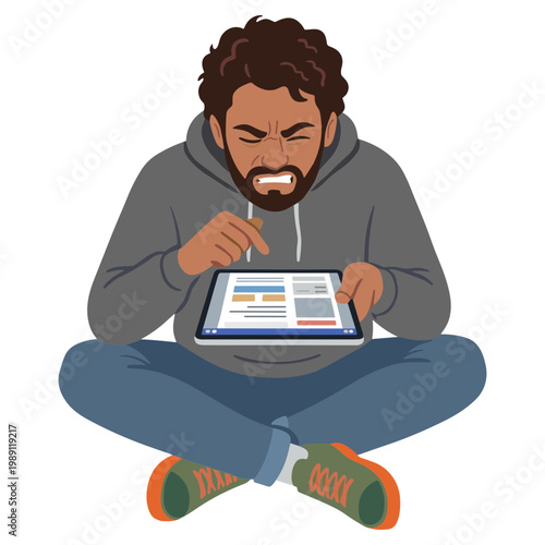 A man sits cross-legged while looking at a tablet with concern