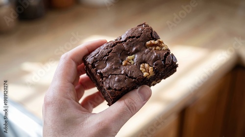 Gluten Free Bakery Snack, Healthy Gluten Free Treat, Organic Snack Bakery, Delicious Gluten-Free Brownie with Nuts in Hand