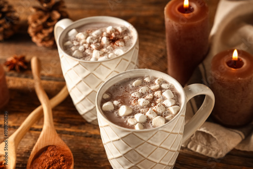 Cups of hot cocoa drink wit...