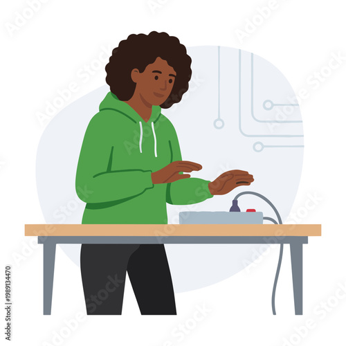 A woman examines a device on a table in a lab setting carefully.