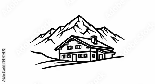 Mountain chalet with dramatic peaks in background