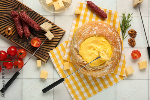 Cheese fondue in bread with...