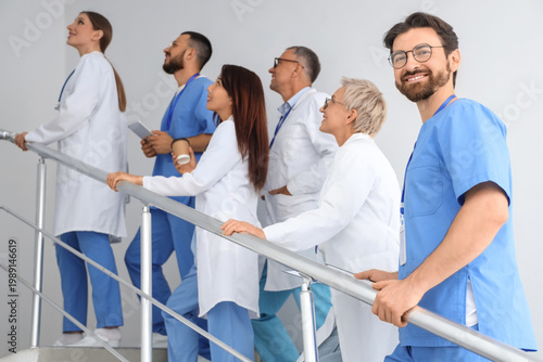 Team of doctors walking ups...