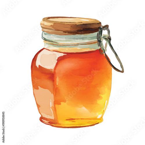 Glass jar of golden honey.