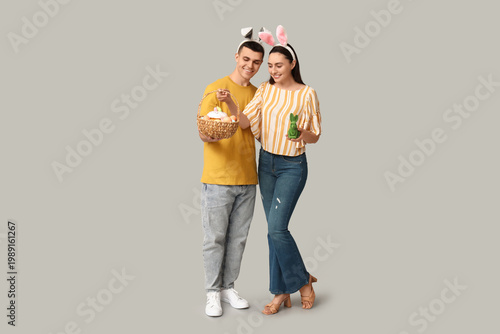 Happy young couple with Eas...