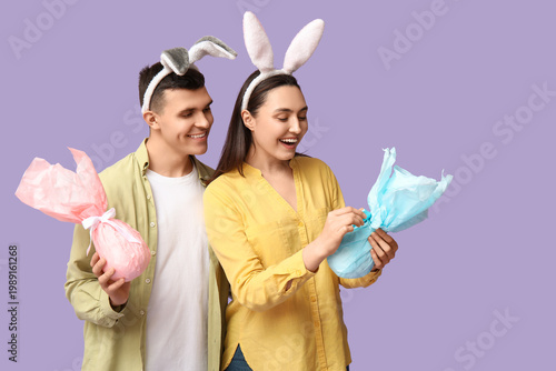Happy young couple with Eas...