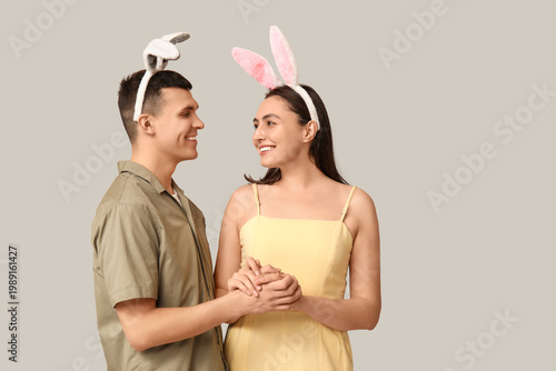 Happy young couple with Eas...