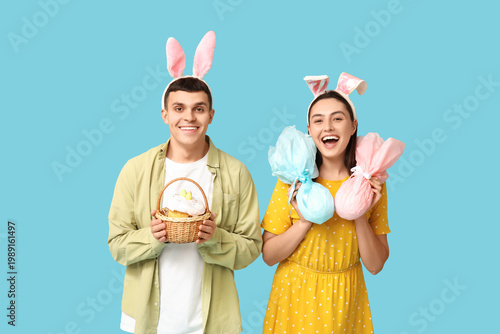 Happy young couple with Eas...