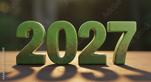 Green 2027 numbers on a wooden surface
