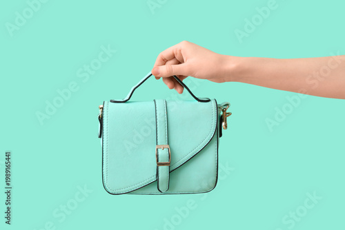 Female hand with stylish tu...