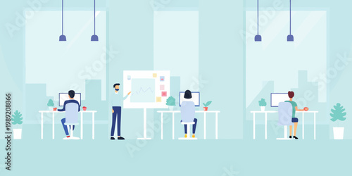 Modern office space with people collaborating and working on computers