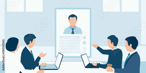 Business team conducts a video conference with a professional on screen