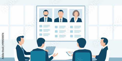 Team conducts a video interview with candidates displayed on a large screen