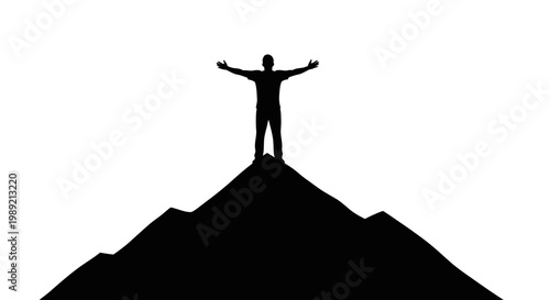 Man standing on mountain peak triumphantly.