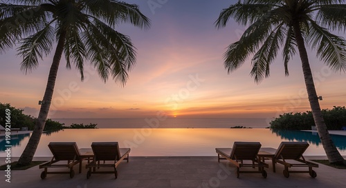 Sunset pool at tropical resort with palm trees and lounge chairs