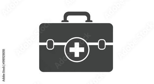 Dark grey first aid kit box with a handle and white medical cross sign on the front for healthcare