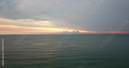 Pan to left, sunsets in Port Dickson, Malaysia.