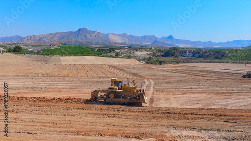 фотографія D10 bulldozer crawler tractor in the process of scarifying earth platforms