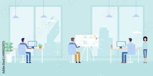 Modern office space with employees collaborating and working at desks