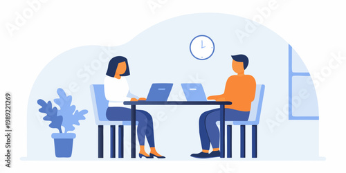 Job interview scene with two people seated at a desk with laptops