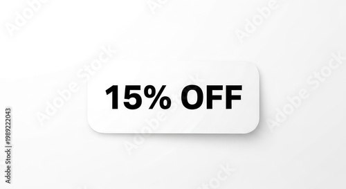 A white discount label with 15 percent off on a plain background