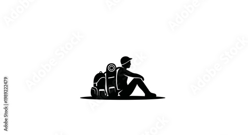 Man sitting with travel backpack.