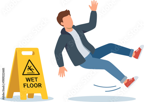 Man slips on wet floor with caution sign nearby indoors