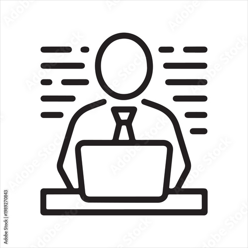 Business professional working on a laptop at a desk with blinds