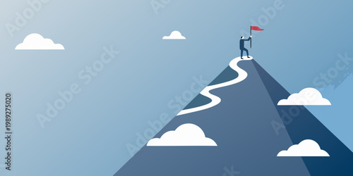 A lone figure plants a flag atop a winding mountain path