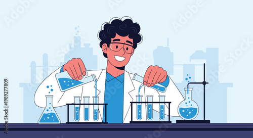 Cheerful young male scientist in a lab coat and safety goggles pouring blue liquids into test tubes for a chemistry experiment.