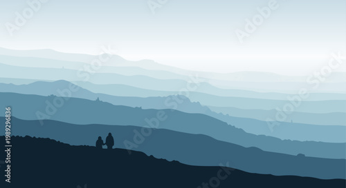 Silhouetted figures stand on a ridge overlooking layered, misty mountain ranges.