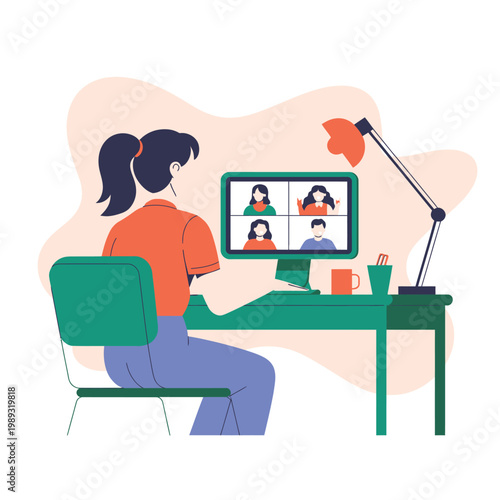 Woman sitting at a desk participates in a video conference call on her personal computer screen.