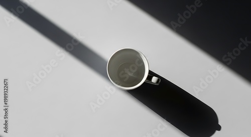 Minimalist coffee cup resting on a sleek black stylus illustration