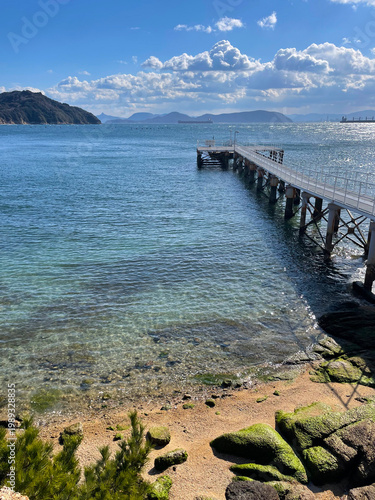 White pier on Naoshima, Japan, with islands in the background