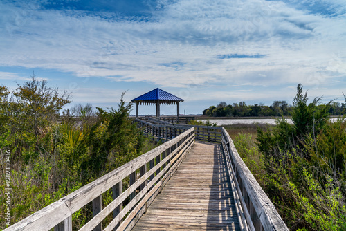 view of the Intracoastal Waterway and the Southport historic riverwalk marsh bridge and gazebo