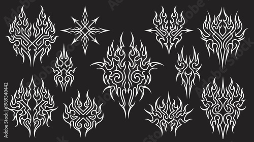 Set of tribal flame ornamental tattoo vector designs on black background.