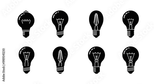 Variety of black silhouette light bulbs a collection of different filament designs on white
