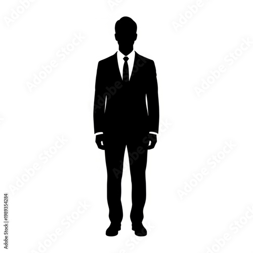 Silhouette of a Businessman Standing Alone.