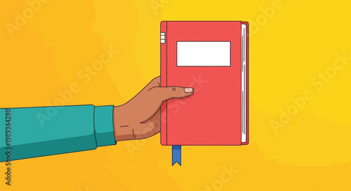 Hand holding a red notebook with a blank label on a yellow background