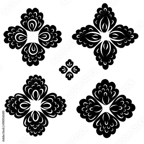 Vector set of black silhouettes of folk art floral mandalas isolated from the background. Collection of decorative floral rosettes.