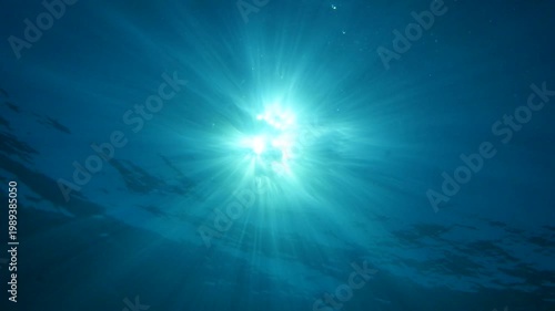 sun ray and sun beam scenery underwater waves on surface of water slow ocean scenery for background