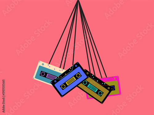 Colorful cassette tapes hanging from strings on pink background nostalgic music