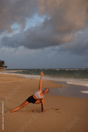 Calm meditative woman. Peaceful blonde woman in meditation pose with tranquil ocean view behind her
