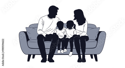 A family of four sits together on a comfortable gray sofa